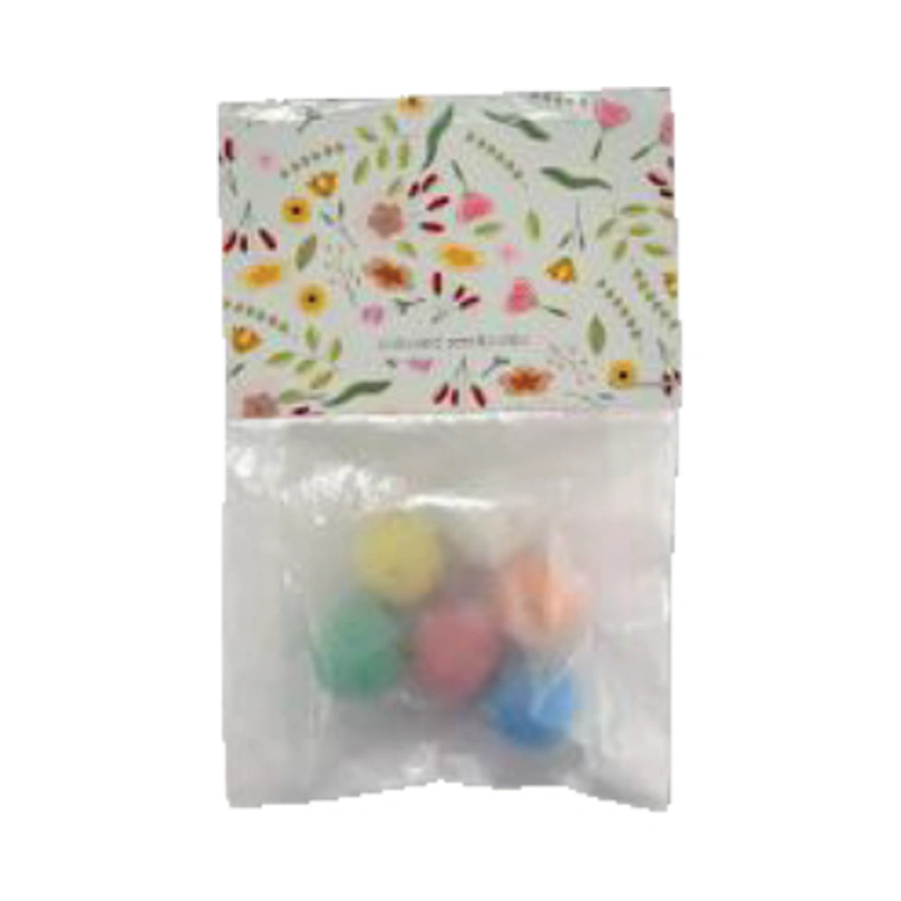 Glasinpåse med färgade fröbomber